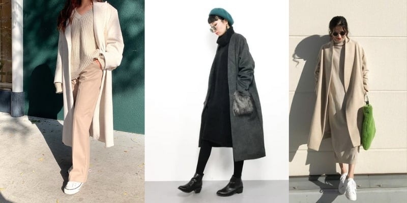 Cô gái mặc áo len rộng màu kem bên trong áo khoác dạ dáng dài màu be, phối cùng quần suông trắng, tạo phong cách thanh lịch, sang trọng mùa đông.