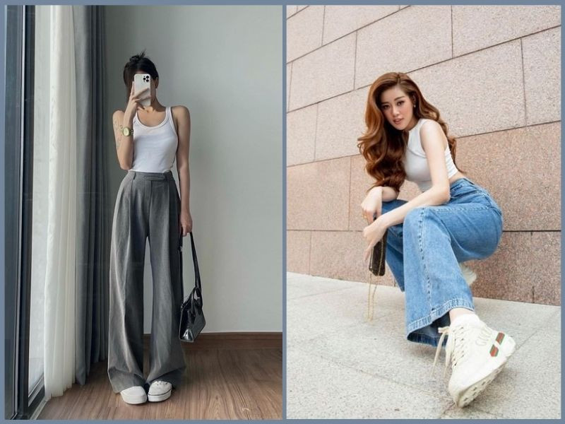 Cô gái trẻ mặc áo ba lỗ màu trắng kết hợp với quần ống suông jean xanh, toát lên vẻ năng động và thoải mái, rất phù hợp cho những ngày hè oi ả