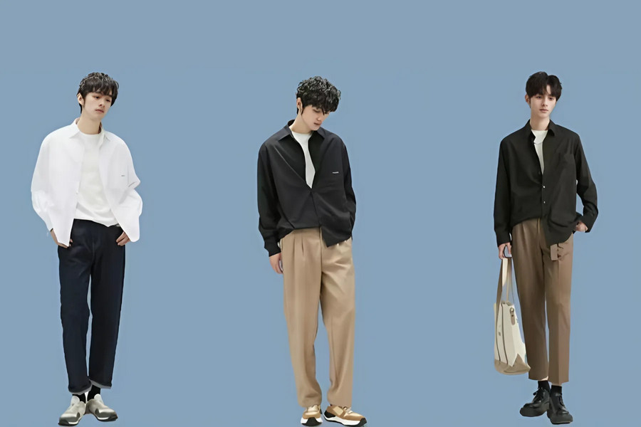 Hai chàng trai phối áo sơ mi trơn màu cơ bản: áo trắng với quần đen và áo đen với quần nâu, đi kèm giày thể thao năng động.