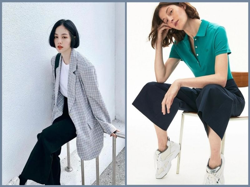 Hai cô gái mặc quần ống suông với áo màu sắc hài hòa, một người kết hợp áo sơ mi xanh nhạt với quần be, người kia áo sơ mi trắng với quần đen, thể hiện sự tinh tế trong phối màu