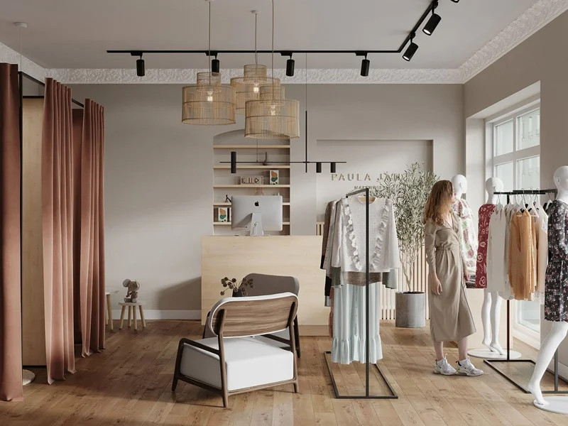 Hệ thống đèn trần spotlight và đèn âm trần làm nổi bật các sản phẩm thời trang trong shop quần áo