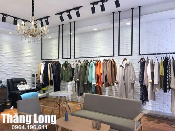 Hệ thống kệ treo quần áo gắn tường hiện đại cho shop thời trang