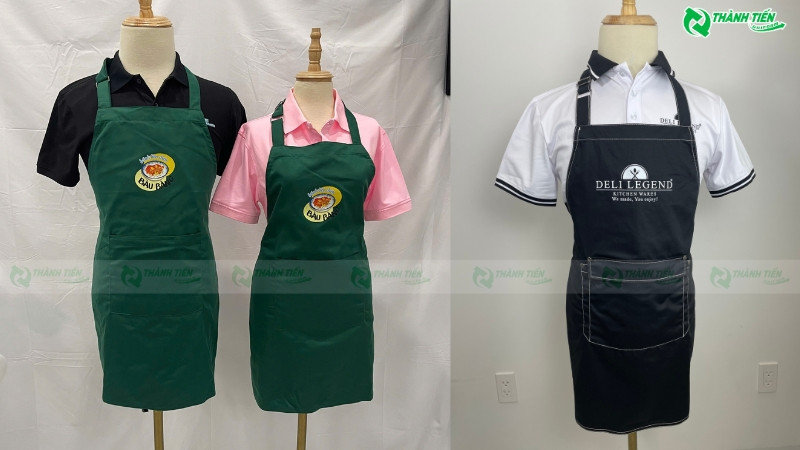 Mẫu tạp dề đồng phục màu xám có logo thêu, thiết kế đơn giản nhưng chuyên nghiệp, phù hợp cho ngành dịch vụ