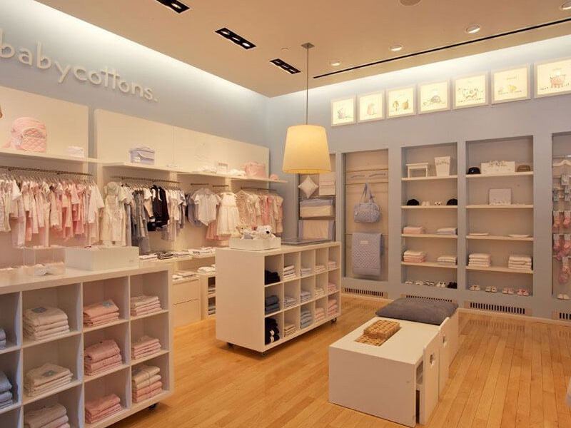 Mẫu thiết kế mặt tiền cửa hàng quần áo trẻ em hiện đại, thu hút ánh nhìn