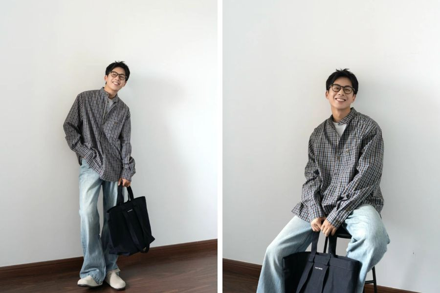 Phối áo sơ mi tay dài oversize kẻ sọc cùng quần jeans ống rộng và giày sneaker trắng, mang đến vẻ ngoài thoải mái, phóng khoáng.