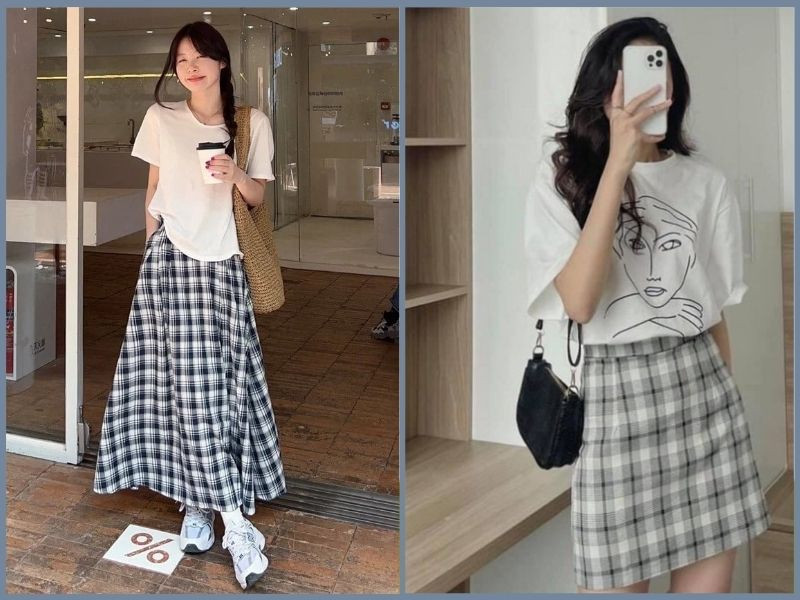 Phối đồ trẻ trung, năng động với áo thun rộng màu đen và chân váy kẻ caro đỏ, cùng giày sneaker trắng tạo điểm nhấn nổi bật.