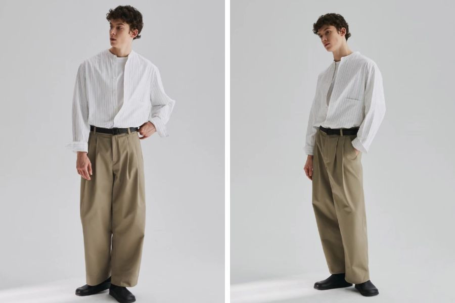 Phong cách trưởng thành, thanh lịch: áo sơ mi sọc dọc layer áo thun, kết hợp quần xếp ly màu be dáng rộng và giày da.