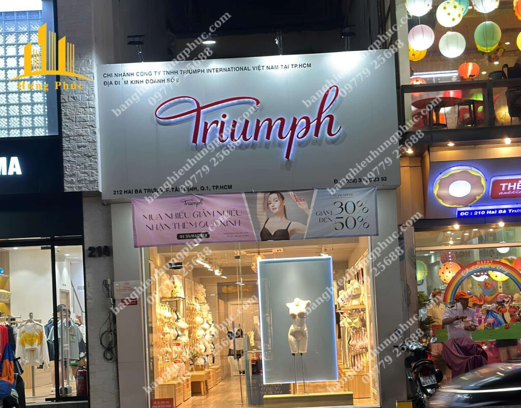 Thiết kế bảng hiệu cửa hàng thời trang nữ sang trọng với tông màu trắng đen