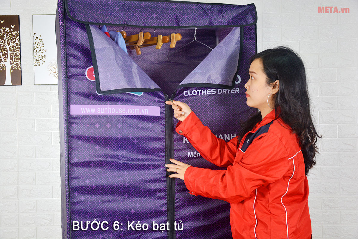 Bước 6: Trùm vải bạt lên toàn bộ khung tủ sấy quần áo Sunhouse SHD2707