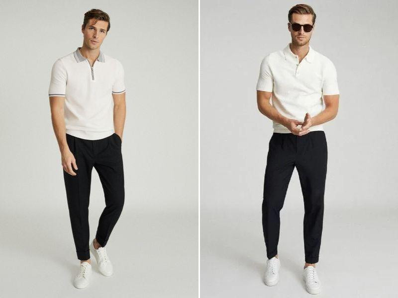 Chàng trai mặc áo polo nam màu xanh than và quần tây trắng kem, phối cùng giày sneaker trắng năng động, vừa cổ điển vừa hiện đại