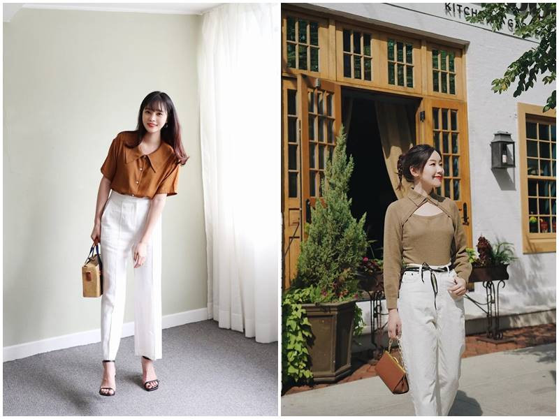 Cô gái mặc áo len nâu dáng croptop phối cùng quần jean trắng ống rộng, tạo vẻ ngoài năng động, hiện đại và trẻ trung.