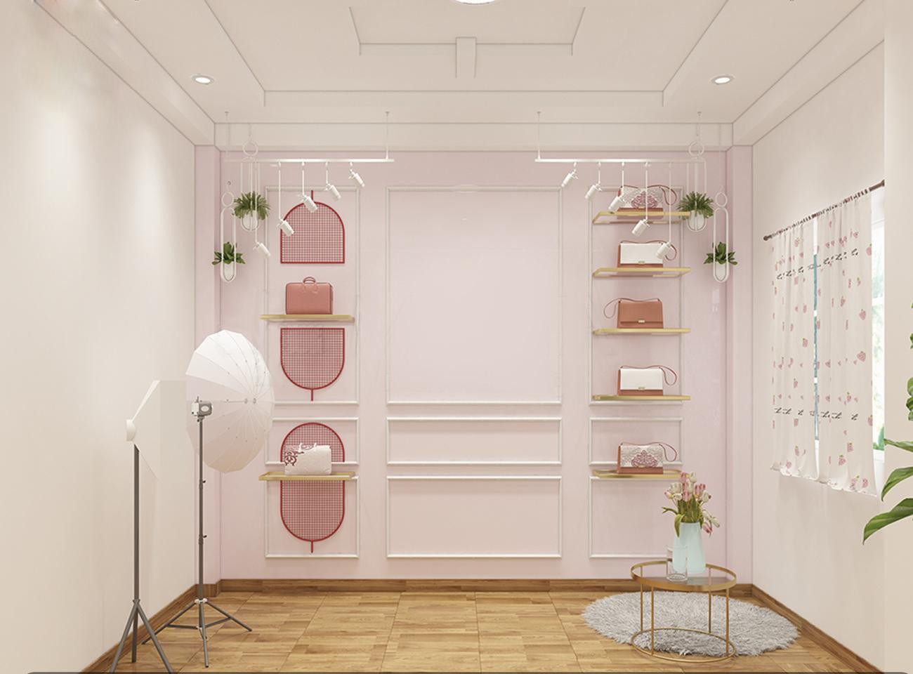 Mẫu thiết kế phòng livestream thời trang nữ với tông hồng pastel dịu nhẹ, backgroud đơn giản tập trung tôn vinh vẻ đẹp của sản phẩm