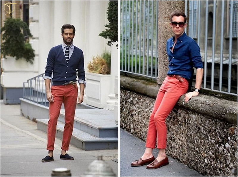 Người đàn ông cá tính với áo khoác màu đỏ nổi bật bên ngoài áo sơ mi xanh tím than, tạo điểm nhấn ấn tượng cho trang phục.