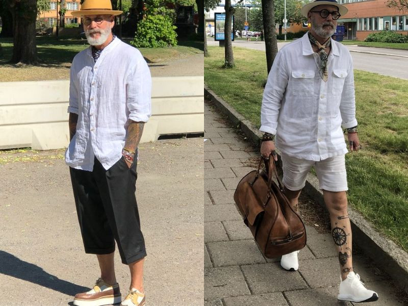 Người đàn ông trung niên trong trang phục áo sơ mi kaki dáng rộng, ưu tiên sự thoải mái và phong cách nam tính.