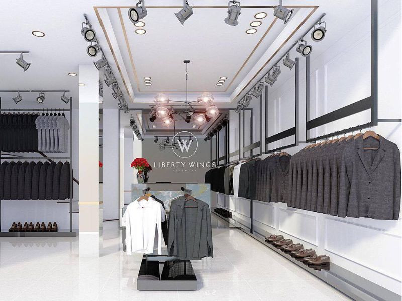 Quý ông trung niên phong cách trong áo sơ mi và áo vest len tại Liberty Wings, thể hiện sự tinh tế và ấm áp.