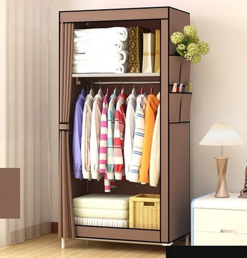 Tủ đựng quần áo mini bằng vải khung kim loại chắc chắn, thiết kế 2 buồng 4 ngăn, màu hồng nữ tính, dễ dàng tháo lắp và di chuyển.